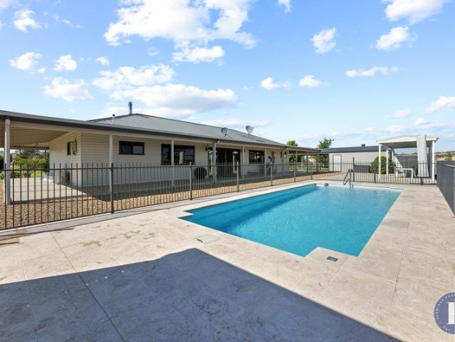 A Rare Opportunity: Quality Home, Acreage and Infrastructure Combined