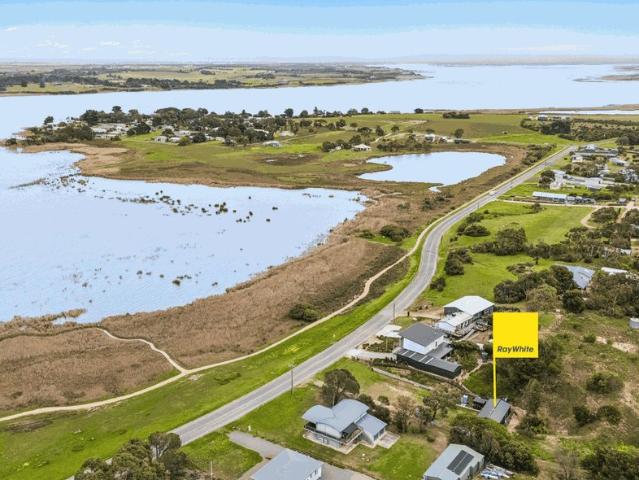 A Rare Lakefront Position with Endless Potential