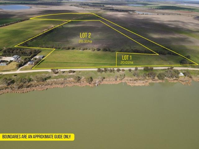 A Rare Lakeside Opportunity with Stunning Elevated Views
