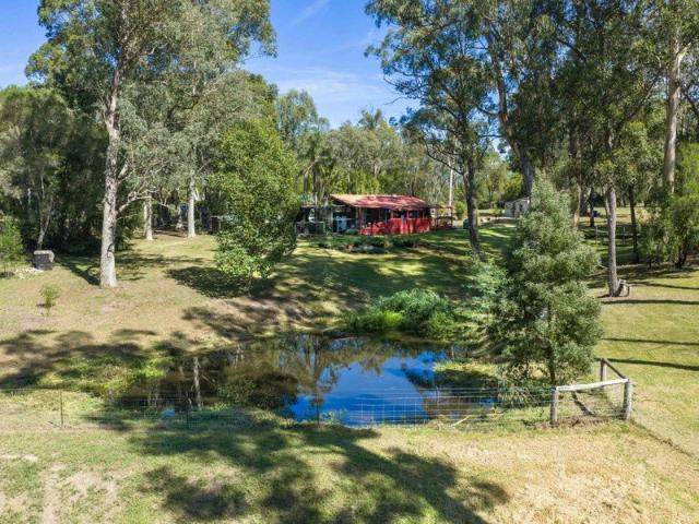 A RARE LIFESTYLE OPPORTUNITY â DUAL LIVING, BUSINESS POTENTIAL & 5 ACRES OF CHARM