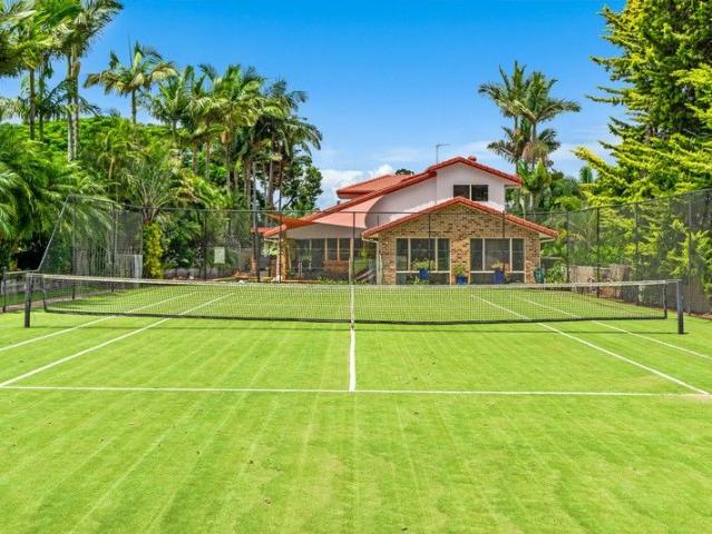Rare Burleigh Waters Opportunity Huge 1,562m² Block with Tennis Court & Development Potential 2.7km to Beach