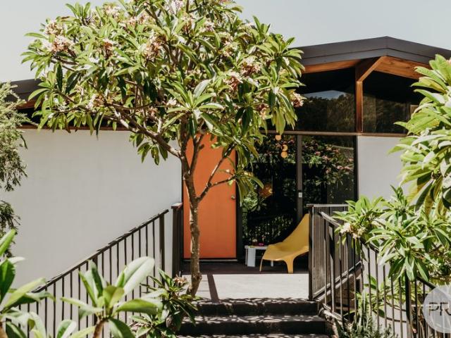 A Rare Mid Century Modern Coastal Retreat Moments from the Sand