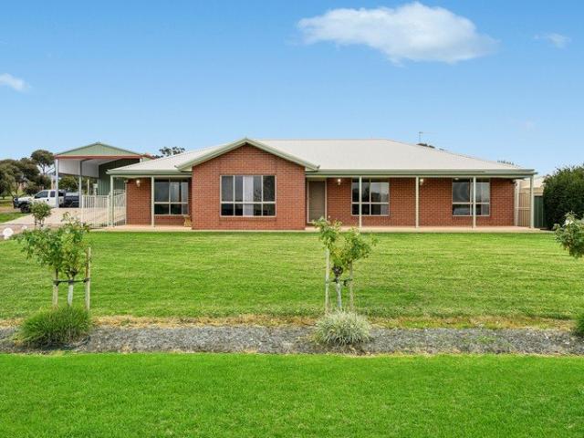A Rare Small Acreage Opportunity with an Impressive Family Home!