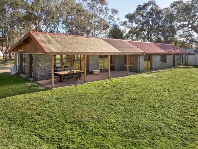 A Rare Slice of Lifestyle Almost 10 Acres Right in Town