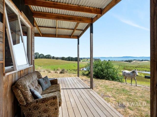 A rare sun filled holding overlooking Norfolk Bay