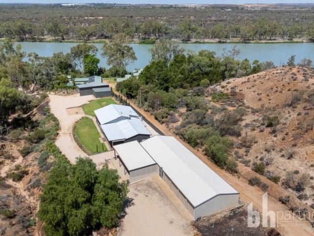 A Rare Riverfront Lifestyle Offering Privacy, Luxury, and Space