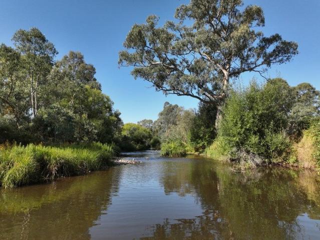 A Rare Riverfront Sanctuary on Two Titles