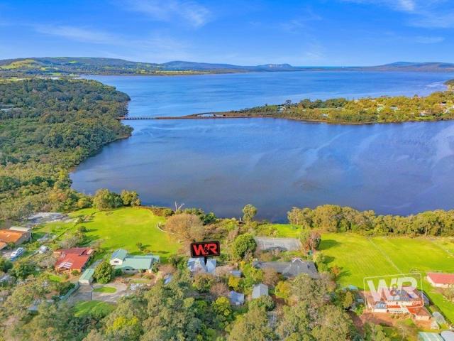 A RARE WATERFRONT SANCTUARY WITH TIMELESS CHARM