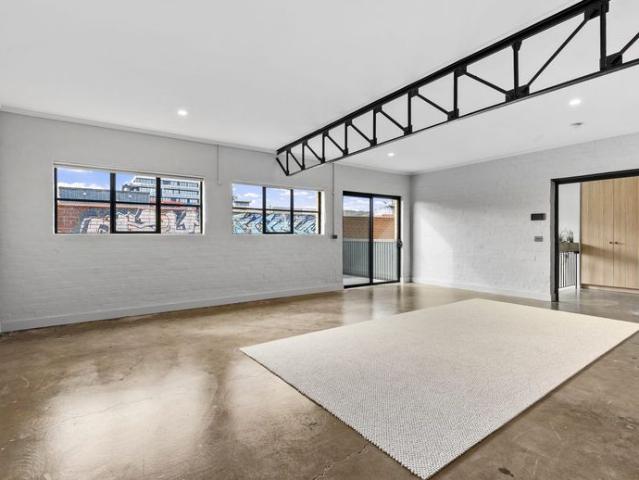 INCLUDING ALL UTILITIES! A RARE WAREHOUSE CONVERSION IN THE HEART OF BRUNSWICK