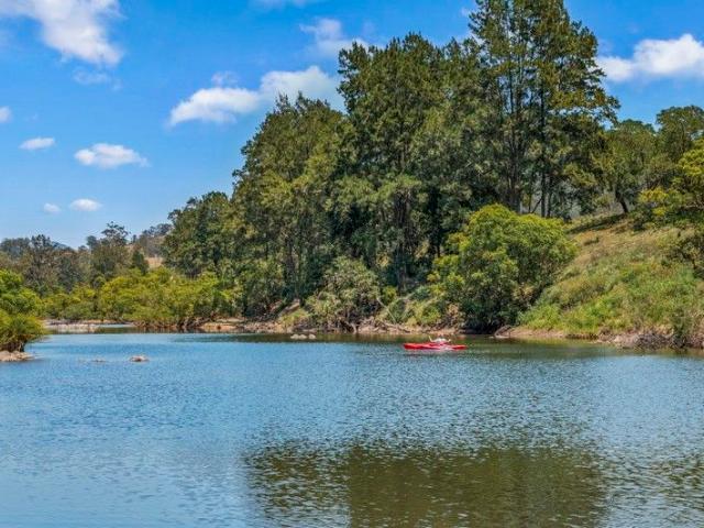 A Rare Weekender, Renovator's Dream & Unmatched Riverfront Escape