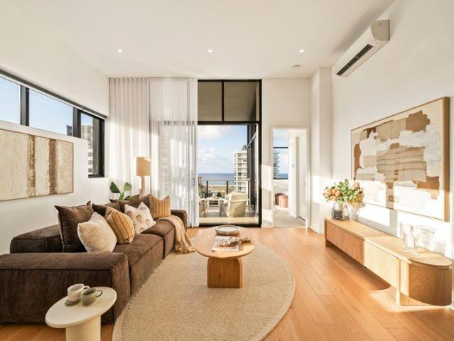 A RARE TOP FLOOR RETREAT WITH OCEAN & HINTERLAND VIEWS MOMENTS FROM ICONIC KIRRA BEACH