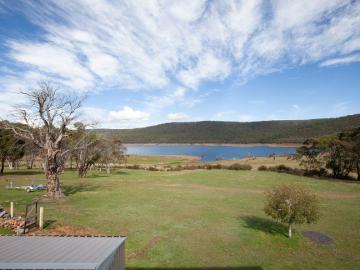 A Rare Turnkey Opportunity Fully Furnished Lakefront Retreat with unrivalled Alpine Access