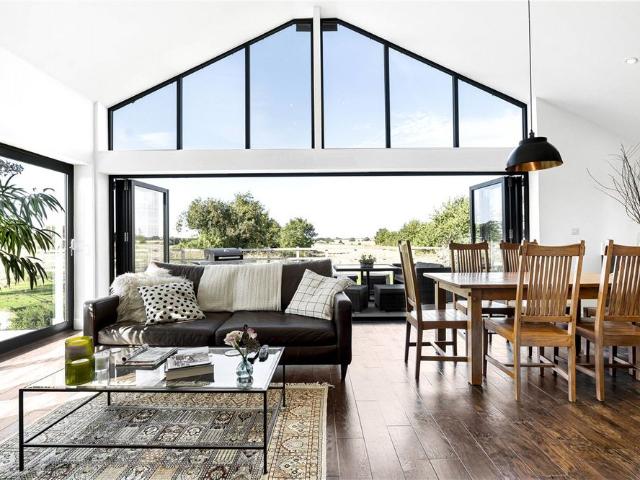A recently built contemporary barn style property occupying a fabulous semi rural position on the edge of this superbly placed village