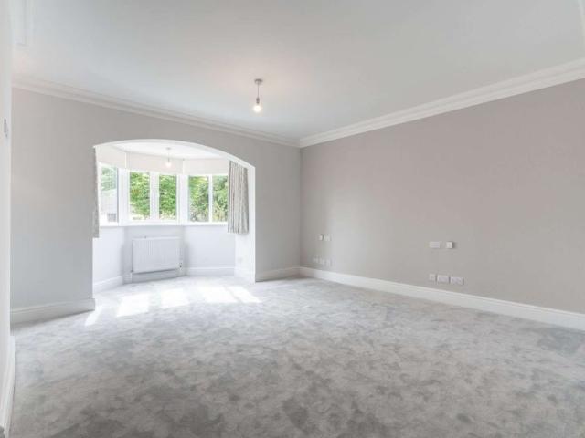 A recently refurbished five bedroom family home with four en suites, extensive living space and a large private rear garden