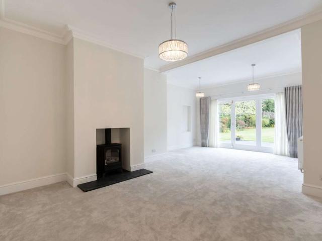 A recently refurbished five bedroom family home with four en suites, extensive living space and a large private rear garden
