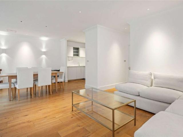 A recently refurbished two bedroom flat within a popular Spitalfields development