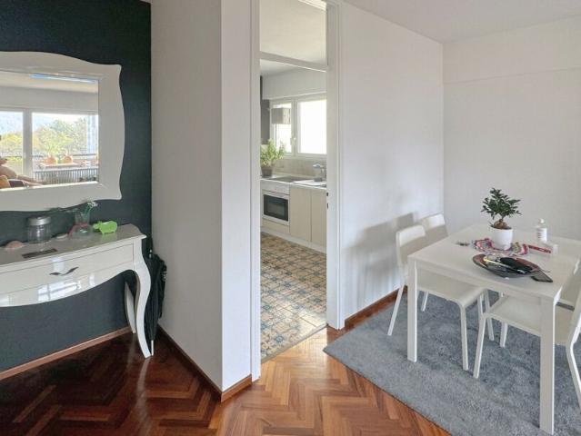 A REDDITO AMPIO 3.5 LOCALI CON BOX E VISTA APERTA A LUGANO