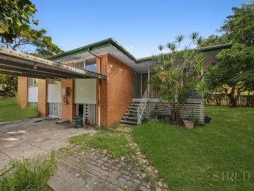Charming Post War Home Packed with Potential on a Flat Family Friendly Block