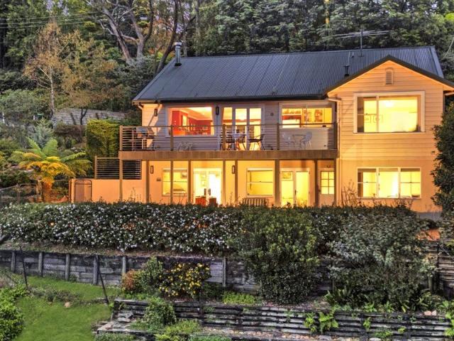 A Retreat Overlooking Valleys to the City Skyline. A Magical Home with Stunning Views from Every Room. Old Fashion Charm Meets Modern Comfort