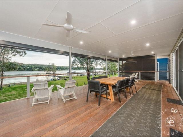 A Riverfront Home Without Compromise