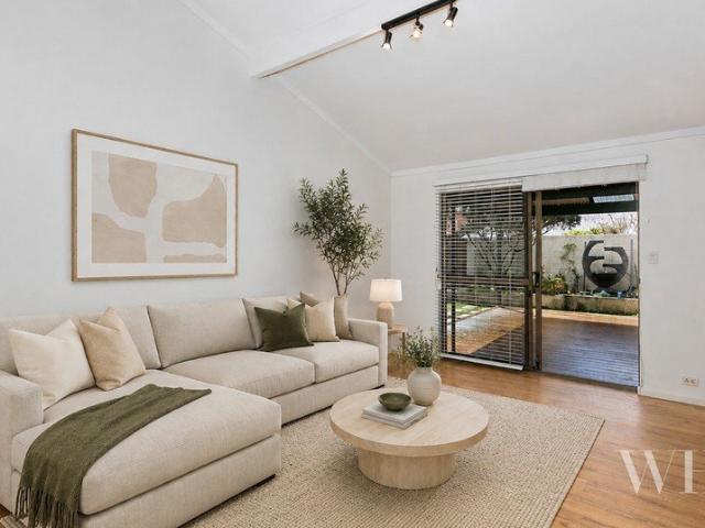 A Riverside Retreat: Low Maintenance & Laidback