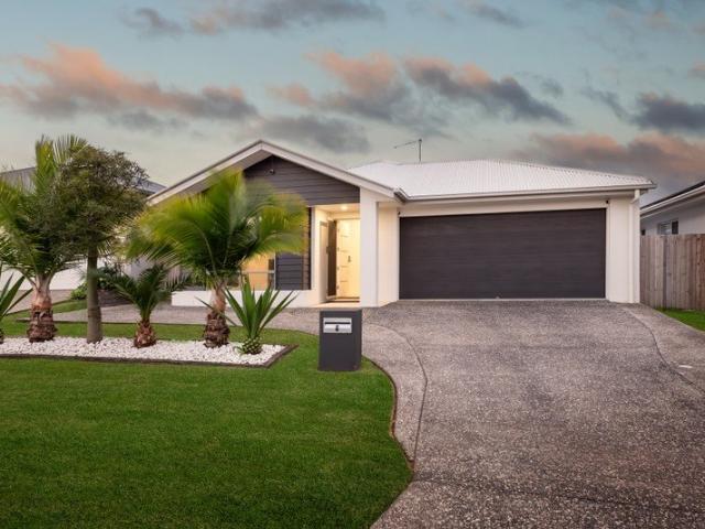 A Standout Opportunity for Modern Family Living in Ormeau