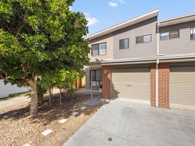 A Standout End Position Townhouse with Space, Privacy & Three Car Accommodation