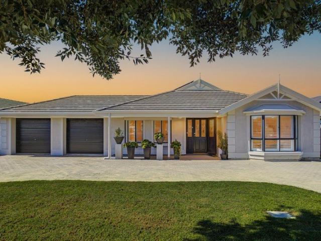 A Standout Family Home with Poolside Appeal in West Beach