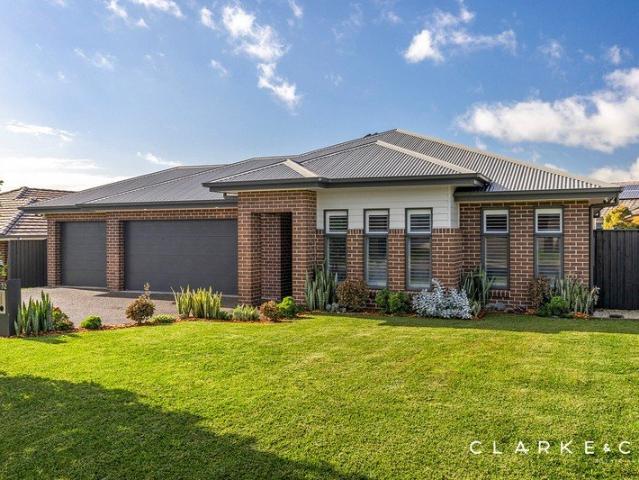 A STANDOUT HOME IN A PRIME CHISHOLM LOCATION!