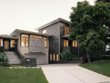 A Statement Family Home Offering Grand Living, Resort Style Pool and Four Car Garage