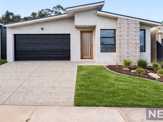 A Statement of Modern Luxury with Dual Master Suites & Designer Living