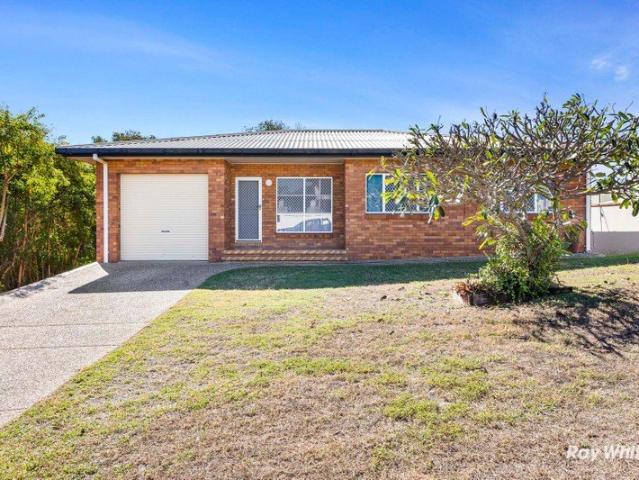 A STONES THROW FROM THE BEACH IN COOEE BAY