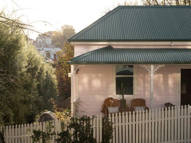 A Storybook Cottage Moments from the Hospital and City