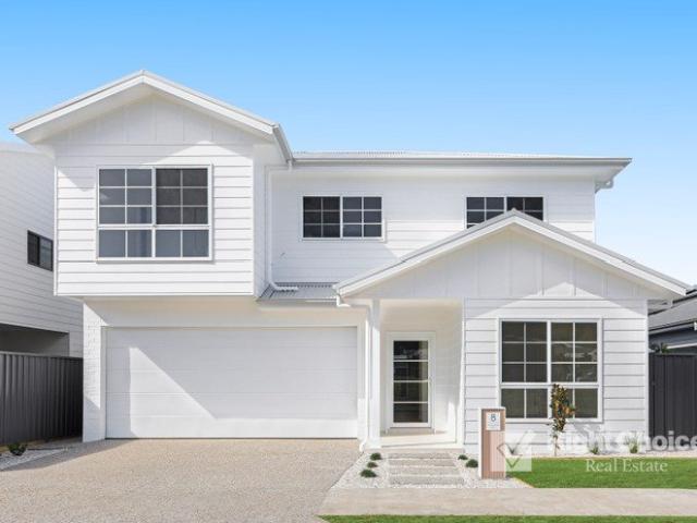 A Stunning Brand New Luxury Home with Escarpment Views