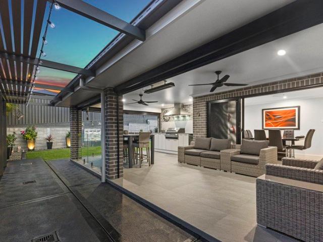 An impeccable near new home with wow factor!