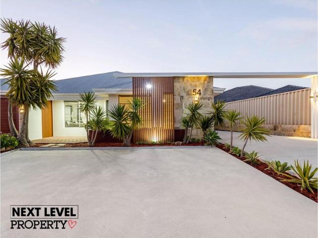 A Stunning Home with Your Very Own Pickleball Court!