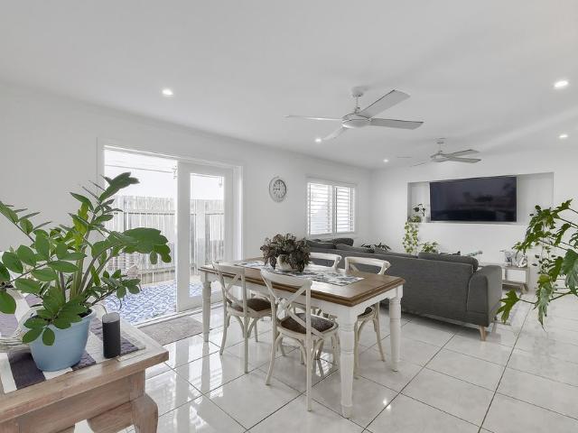 A Stunning Home with a Short Stroll to Paradise!