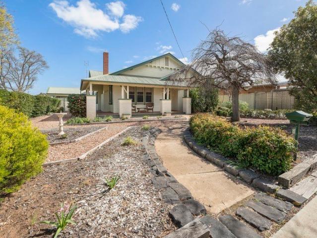 A Stunning Period Home with Modern Comforts & Exceptional Entertaining