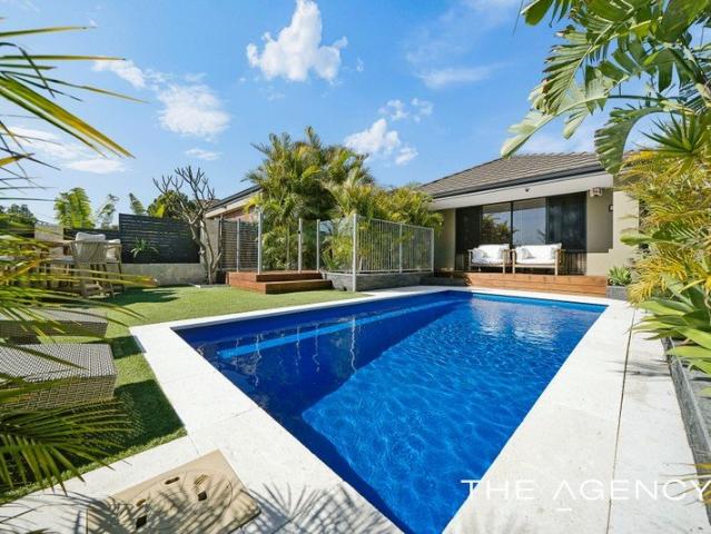 A STUNNING RENOVATED SANCTUARY RESORT STYLE LIVING WITH HOME BUSINESS POTENTIAL!
