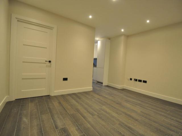 A stunning studio apartment with a patio