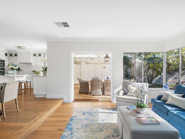 A STUNNING, SUN FILLED FAMILY HOME IN THE ULTIMATE BEACH LOCATION A LEVEL OF REFINED LIVING YOU WON'T FIND ANYWHERE ELSE