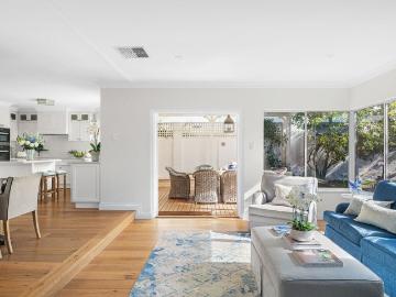 A STUNNING, SUN FILLED FAMILY HOME IN THE ULTIMATE BEACH LOCATION A LEVEL OF REFINED LIVING YOU WON'T FIND ANYWHERE ELSE