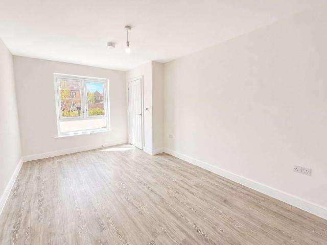 A stylish newly built three bedroom house in Springstead Village