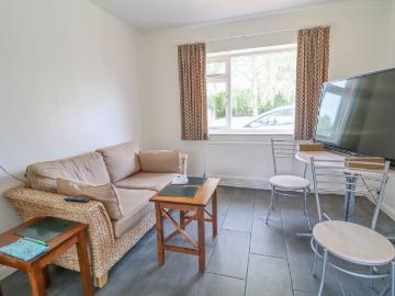 A SUBSTANTIAL DETACHED FOUR BEDROOM HOME WITH A SUPERBLY PRESENTED AND LARGE REAR GARDEN