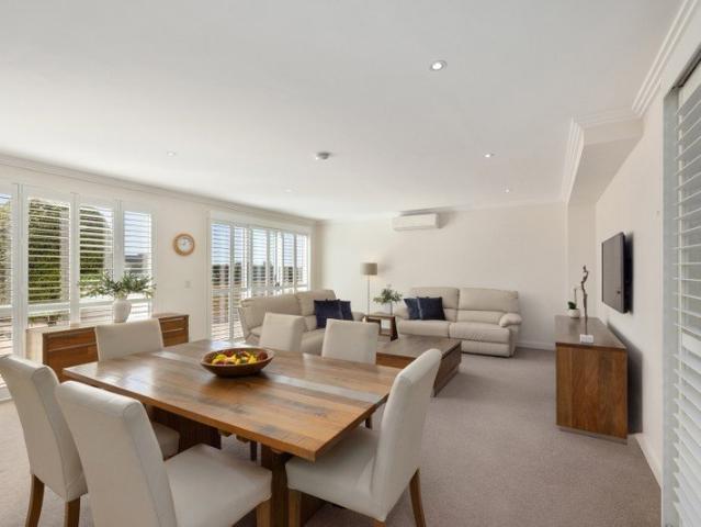 A sun filled two bedroom + study townhouse with house like appeal