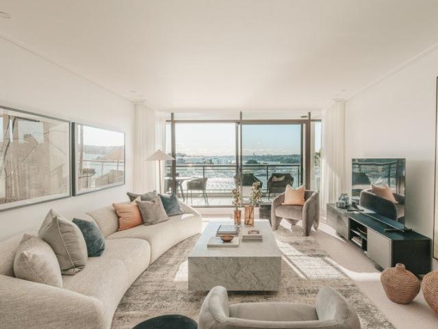A sunlit waterfront sanctuary with panoramic views