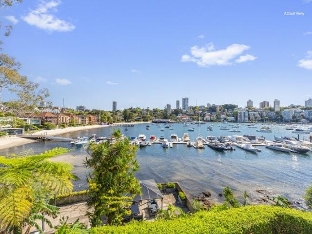 A Sunlit Art Deco Sanctuary On The Water's Edge With Tranquil Unobstructed Harbour Views