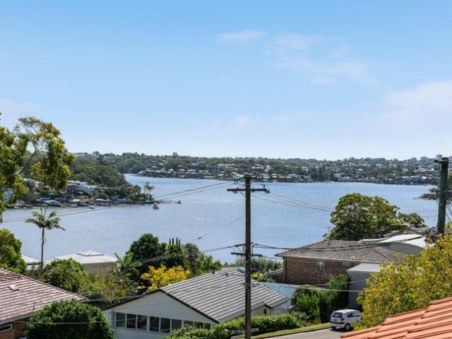 A sunlit family haven with elevated water views and space for everyone