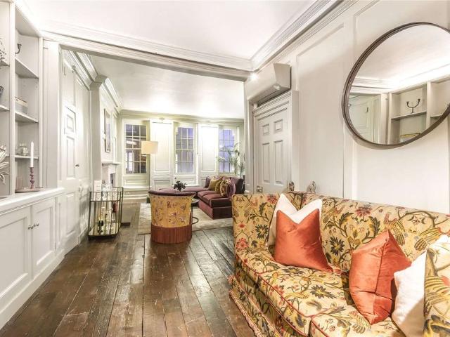 A superb 18th century listed townhouse with a roof terrace in the heart of Soho