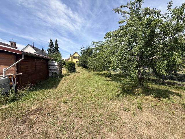 À saisir à Mundolsheim Maison 5 pièces de 137 m2 habitables sur terrain verdoyant de 16,45 ares avec piscine